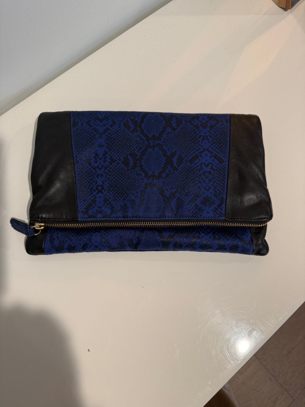Be & D Blue Snake-Print Foldover Clutch with Black Trim